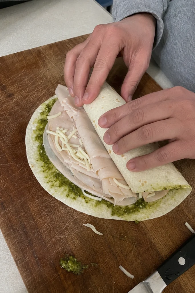 Process Shot of Turkey Pesto Pinwheels